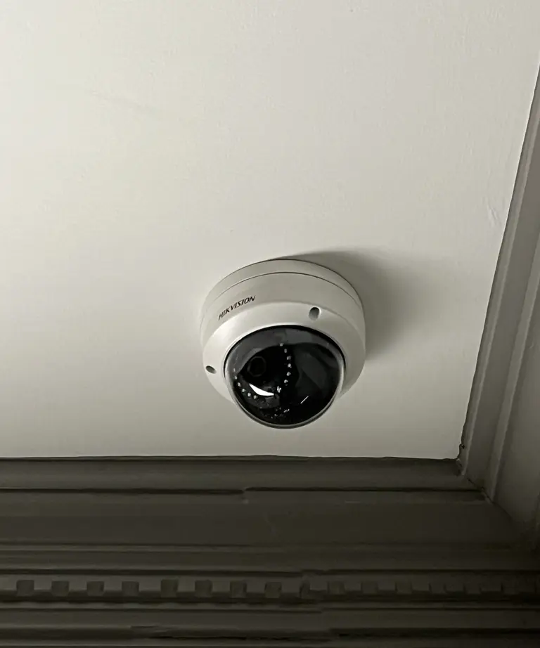 Dome security camera installed on a ceiling by Safe Dwelling Security