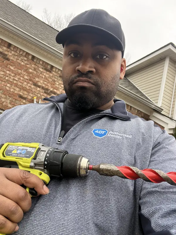 Safe Dwelling Security technician on an install